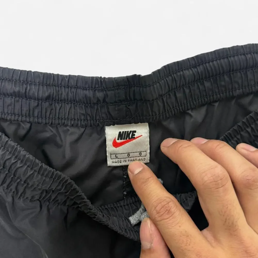 Nike Black Swoosh Track Pants Men’s Size L Windbreaker Athletic Nylon